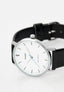 Casio MTP-VT04L-7E analog watch with silver-white dial and black leather strap featuring a minimalist design