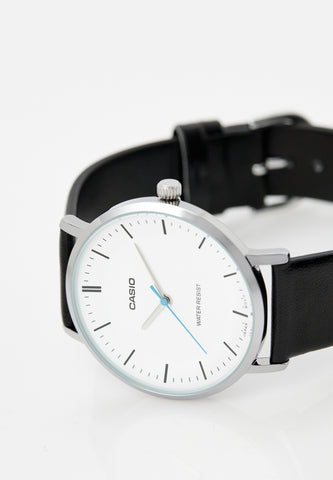 Casio MTP-VT04L-7E analog watch with silver-white dial and black leather strap featuring a minimalist design
