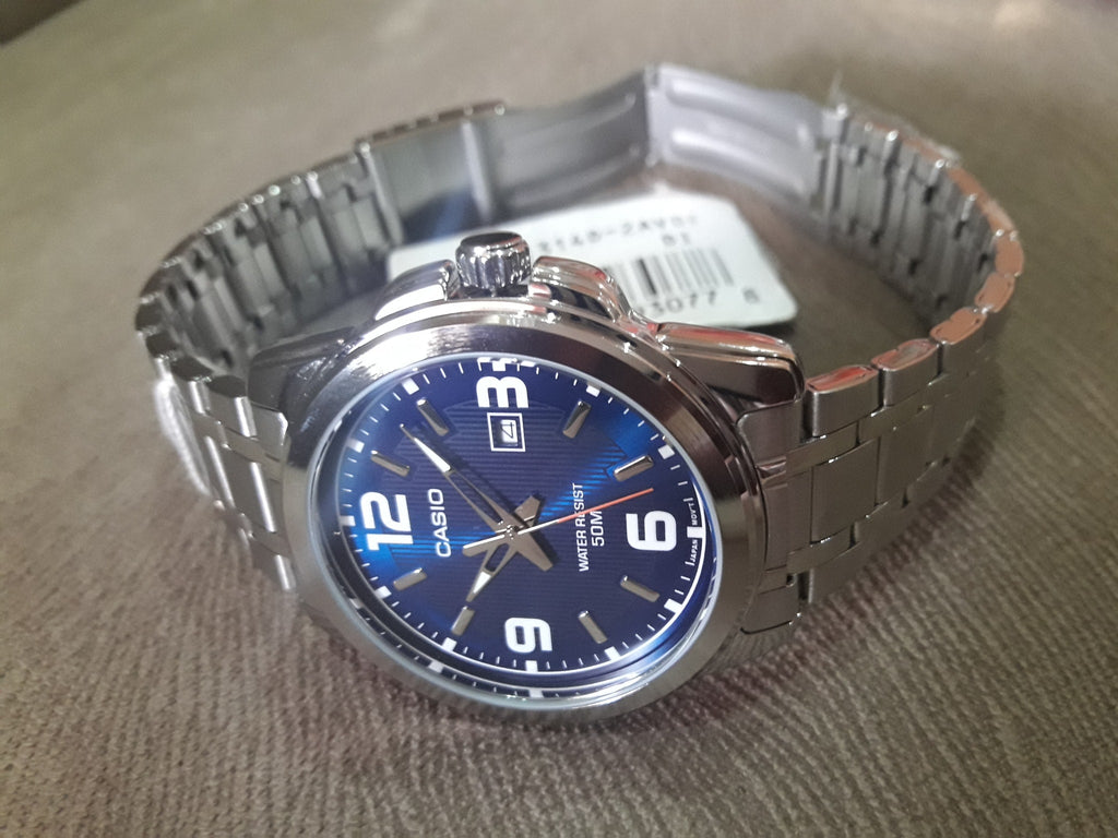 Casio Men's MTP - 1314D - 2A Enticer Series Silver Band Blue Dial with Date Dress Watch - Zamana.pk