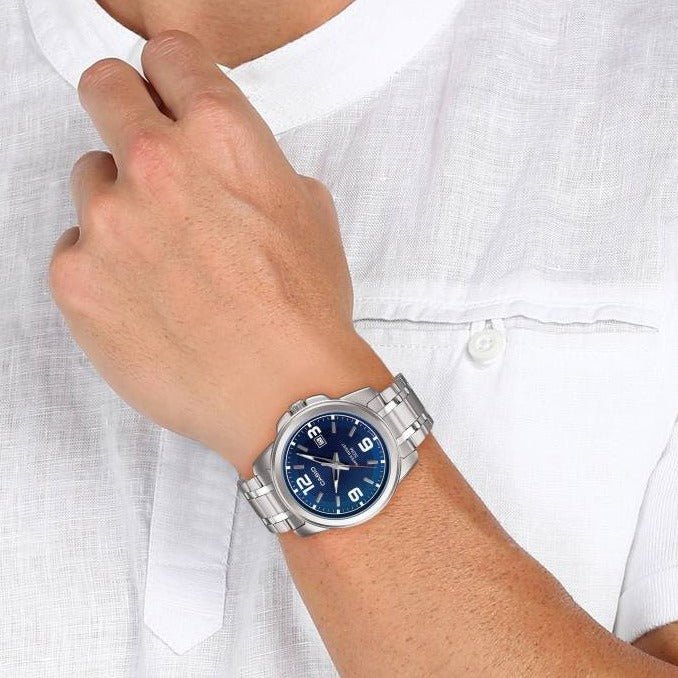 Casio Men's MTP - 1314D - 2A Enticer Series Silver Band Blue Dial with Date Dress Watch - Zamana.pk