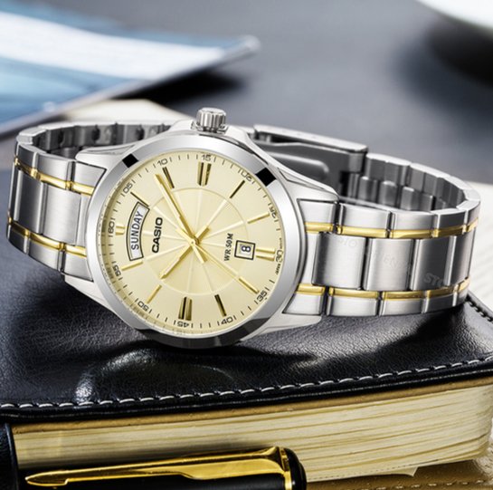 Casio MTP - 1381G - 9AVDF Men's Classic Two Tone Stainless Steel 50M Day Date Gold Dial Watch - Zamana.pk