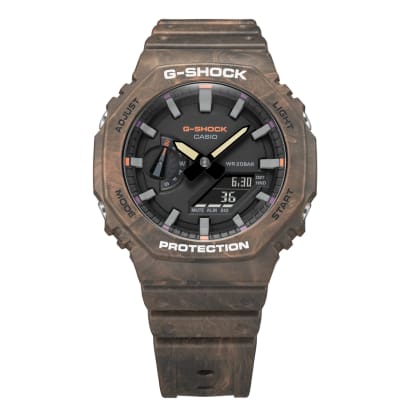 Casio G-Shock GA-2100FR-5A men's digital and analog watch with a rugged, camouflage-inspired design in brown and orange tones, featuring shock resistance