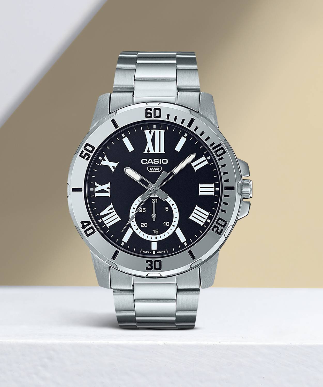Casio MTP-VD200D-1B watch with a black sunray dial and a stainless steel link bracelet.