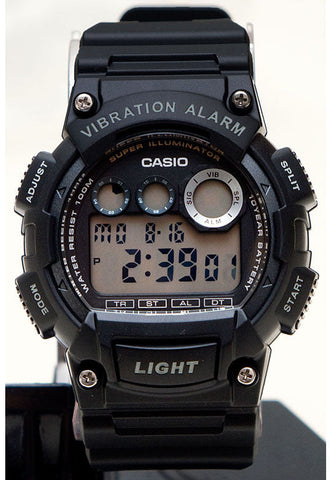 Black Casio digital watch with vibration alarm feature on a white background